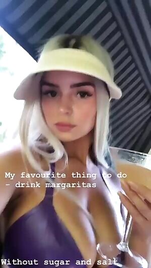 Demi with a drink
