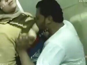 Pakistan Lahore Religious Woman trying not to expose all