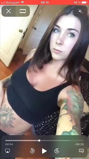 Tatooed girl reveals her nice breast