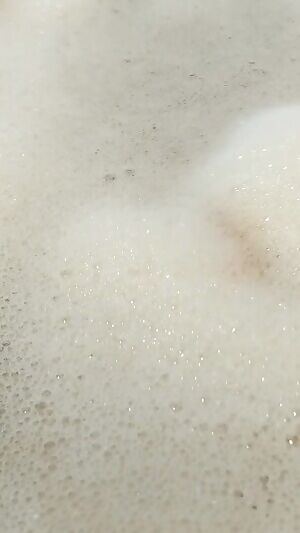 Soapy foreskin in the bath