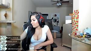 can you partially see her left nip?