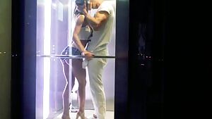 Rough public fuck in the elevator shooted by spectators and drone