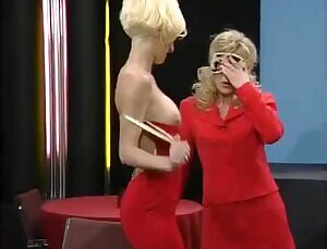 A few ladies present another woman’s ass to a blonde.