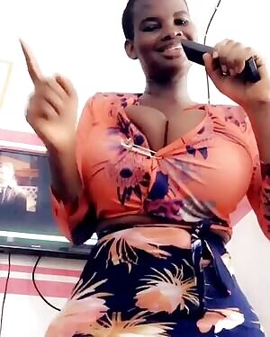 Pam bursting out of her blouse