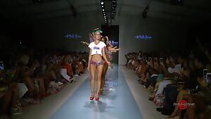 Swimsuit models dancing