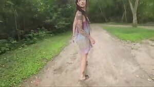 Tattooed beauty goes to the forest. She has a surprise in her ass!