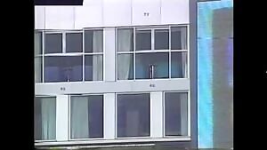 Couple renting a hotel room at the Skydome baseball stadium thought the glass was mirrored