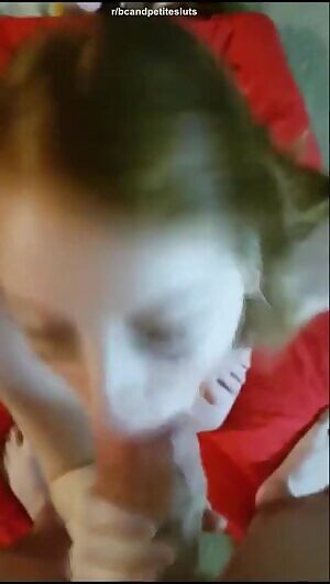 Cute horny redhead blows massive cock