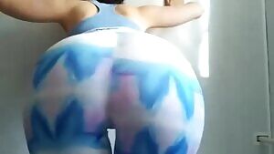 Slowly peeling her leggings down