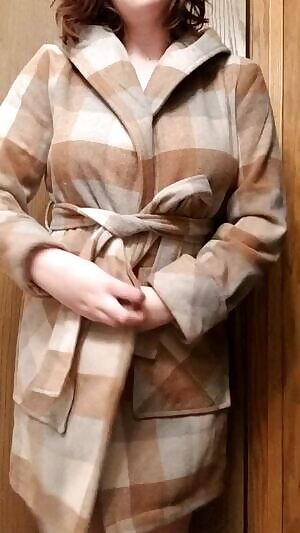 Wanna see what's under my coat?