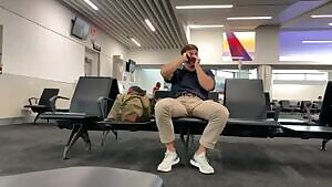 Gorgeous guy at the airport with a delicious looking bulge that he can't stop rubbing