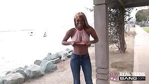 Flashing her titties outside before covering them in cum