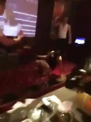 Karaoke girl spraying beer from her hole