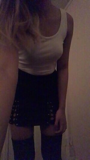 spicing up a black-and-white outfit with hot green panties. only you will know they're green ;)