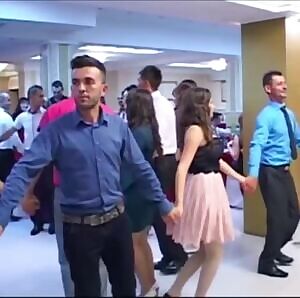 Busty girl adjusting her top