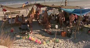 Kara Zielke pouring tea for Jack Bauer and Iron Man in the movie 