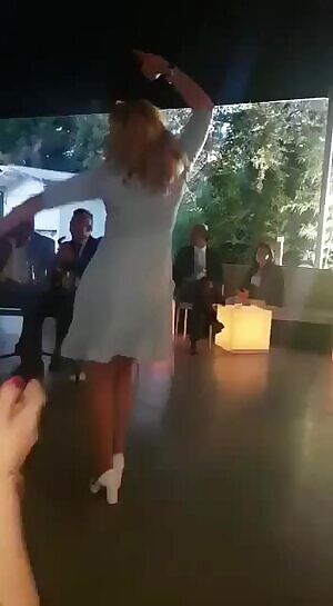 Milf dances in front of everyone at a wedding and flashes her pussy