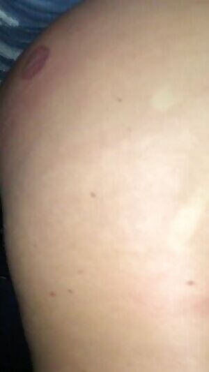 In the parking lot on campus