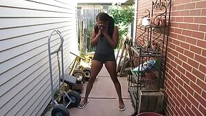 Girl is embarrassed as she pees standing up