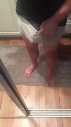 Pulling down the elastic for a thick peek