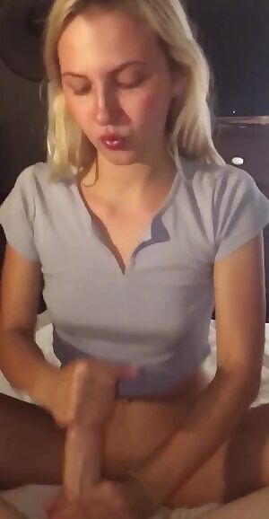 Jerking cock makes her nips hard