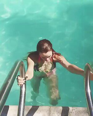 Sabrina exiting the pool