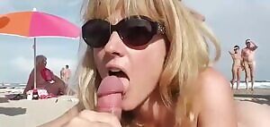 Naomi handles two cocks