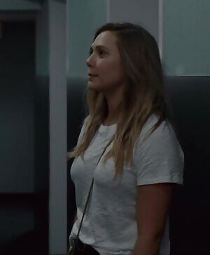 Elizabeth Olsen purse strap plot from Kodachrome