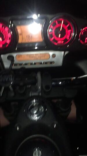 On the back of the bike with my tits out!