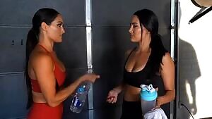 Nikki drenches Bries face