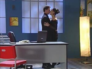 Eating her out on his desk