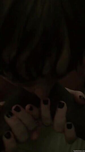 Wife tasting two cocks