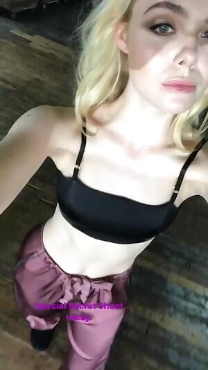 Elle Fanning teasing you with her tongue and her tight body