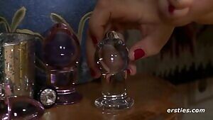 Showing off her glass.