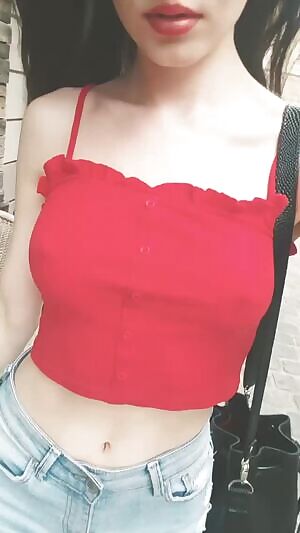 Walking in red top with no bra and short denim shorts