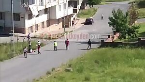 A man shots and kills his wife next to his son and bystanders in middle of the street.