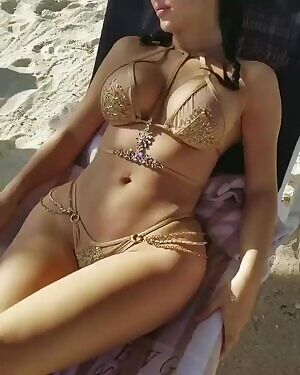 Joselyn Cano sunbathing