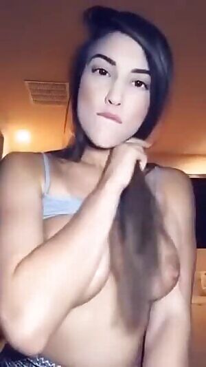 Adorable brunette teasing on cam