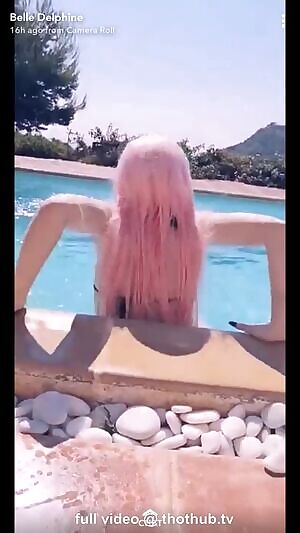 Belle jumping into the pool bikini