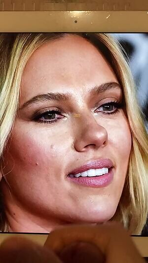 Shooting a big load onto Scarlett Johanssons sexy beautiful face