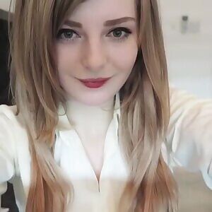 Playing with her hair