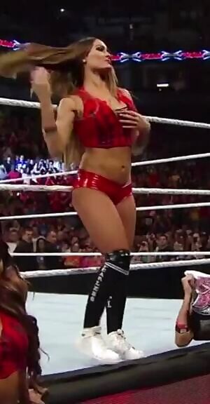 I fucking love Nikki's slutty shirt tear, practically begging every guy in the arena to tit fuck her massive fake bimbo tits