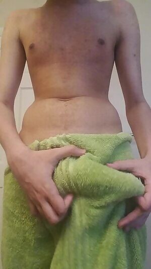 A post-shower towel drop reveal.