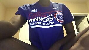 Cubs fan showing off her web gems