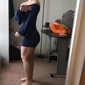 Checking herself out.