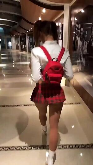 Horribly disfigured girl walking