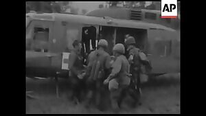 Cameras start rolling shortly after a US Soldier tripped a Vietcong boobytrap.