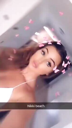 sexy outfit & knows it!