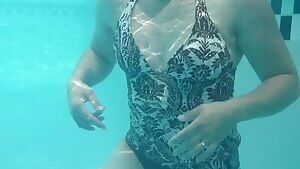 Wife flashing all her goods in the pool