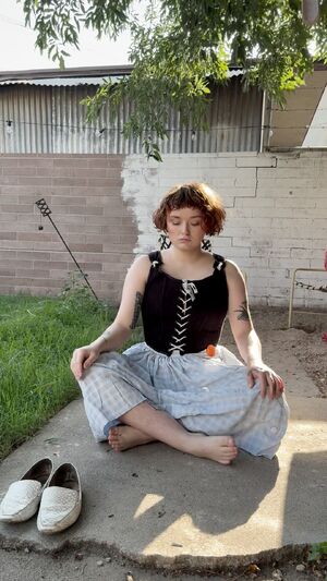 Mommy loves teasing in the back yard.